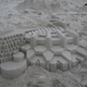 Illustration for article titled Geometric sand sculptures put your bucket-and-trowel creations to shame